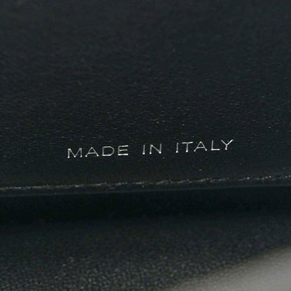 Fendi leather satchel label reading "MADE IN ITALY"