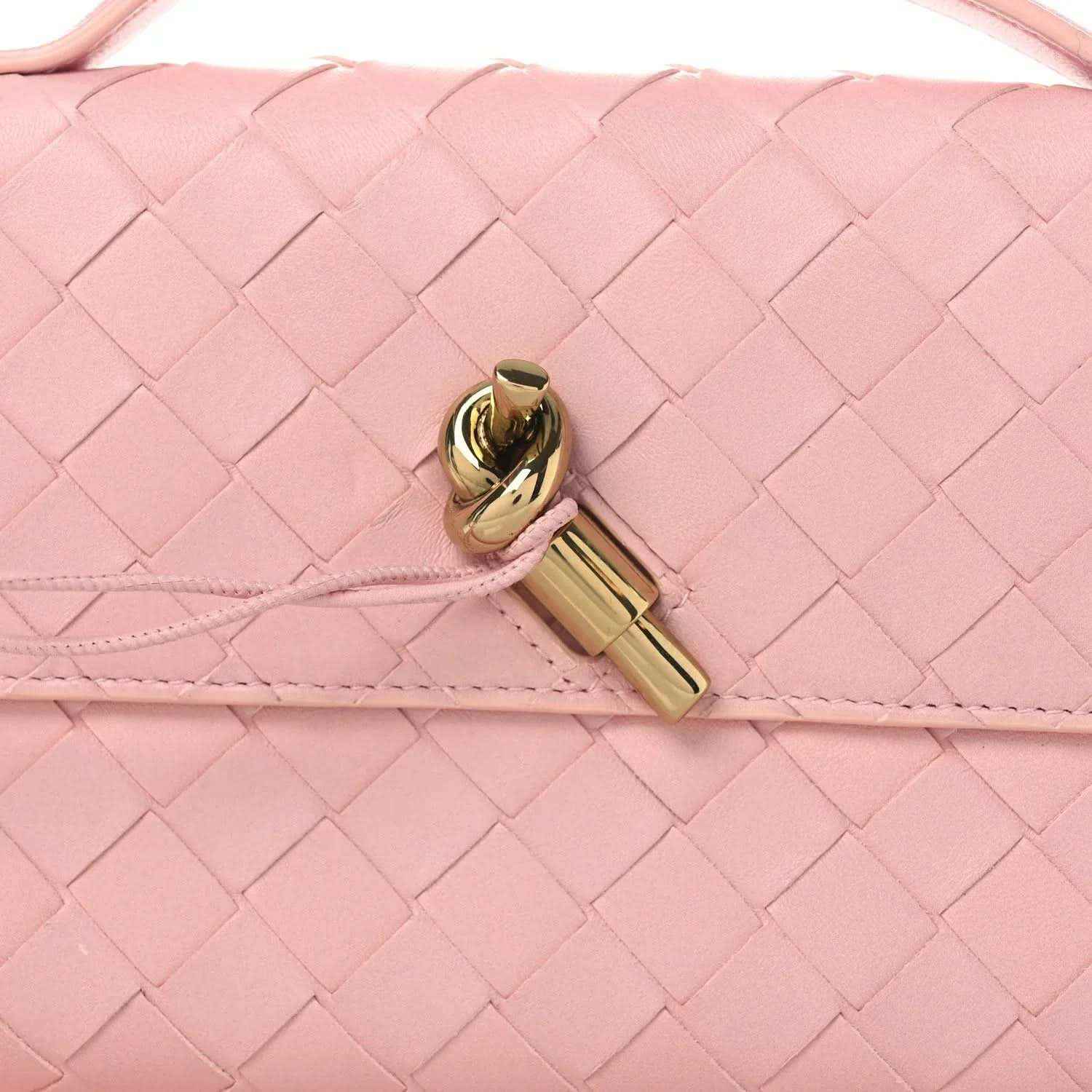Bottega Veneta Rose pink intrecciato nappa clutch with gold-tone clasp detail