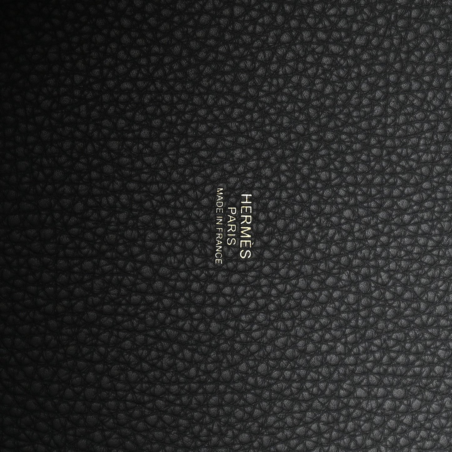 Leather lining in dark gray with embossed text reading "FRAMES" and "Taurillon"