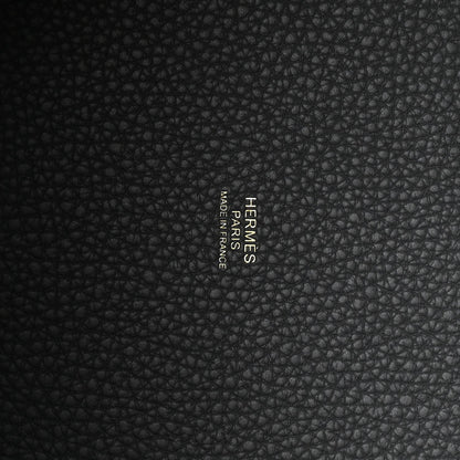 Leather lining in dark gray with embossed text reading "FRAMES" and "Taurillon"