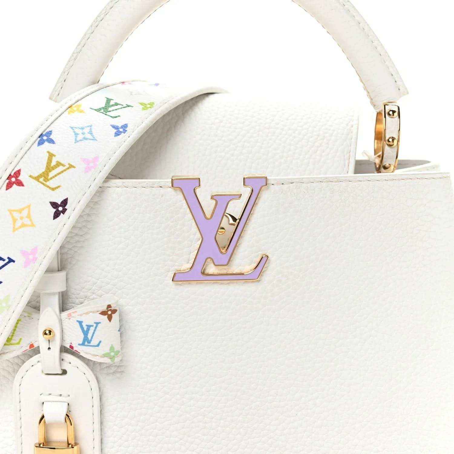 White leather handbag with large LV emblem and multicolor monogram strap detail