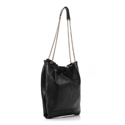 Black quilted leather bucket-style shoulder bag with chain strap
