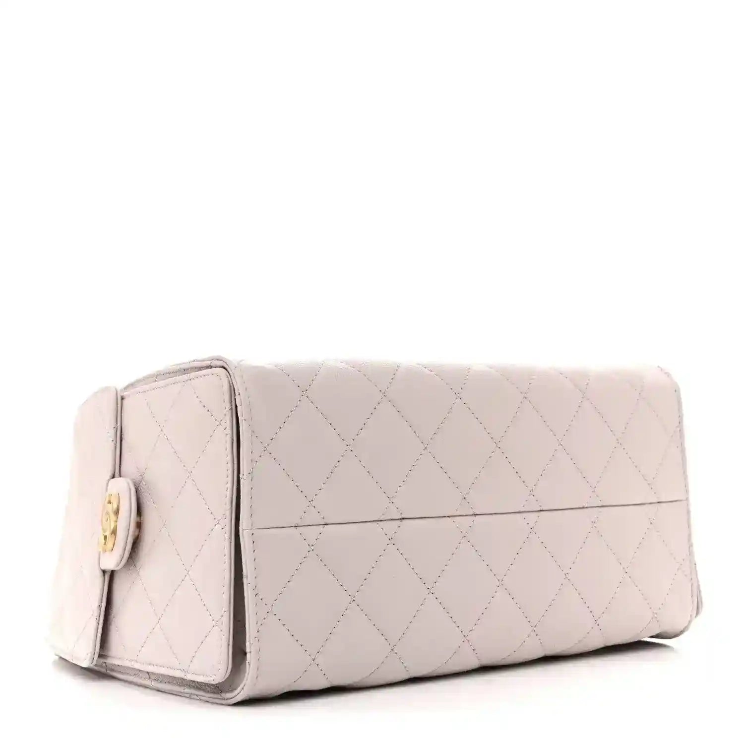 Lilac quilted mini handbag with front flap pocket and gold-tone hardware, structured shape