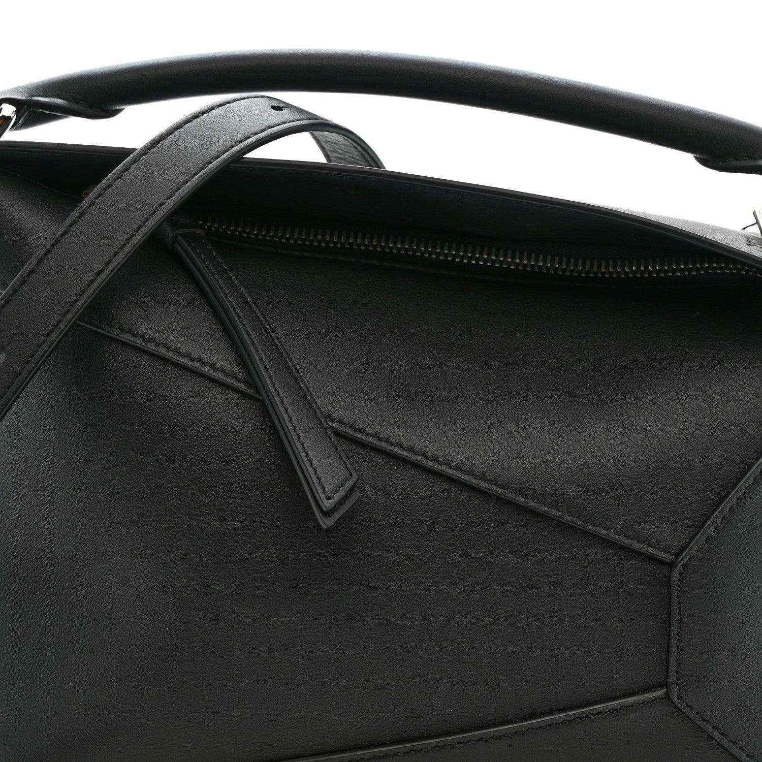 Small Puzzle Edge shoulder bag interior view with black leather pocket and zipper