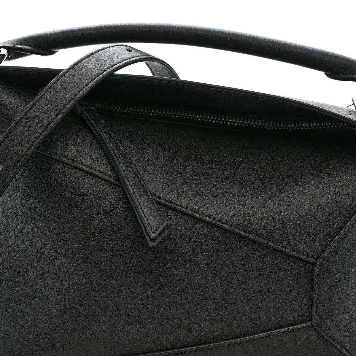 Small Puzzle Edge shoulder bag interior view with black leather pocket and zipper