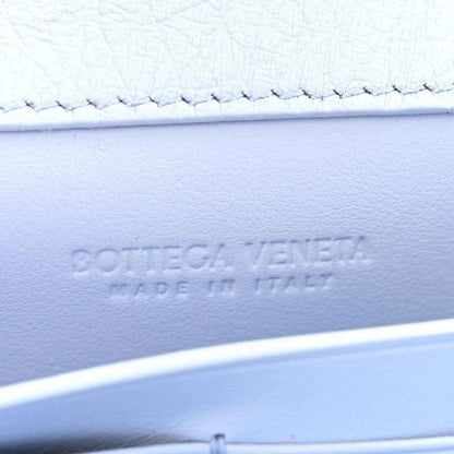 Bottega Veneta ostrich leather clutch bag with embossed logo on front