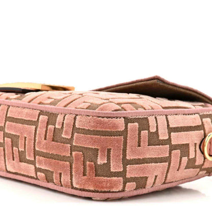 Fendi velvet jacquard baguette bag close-up in macaron pink with FF logo pattern