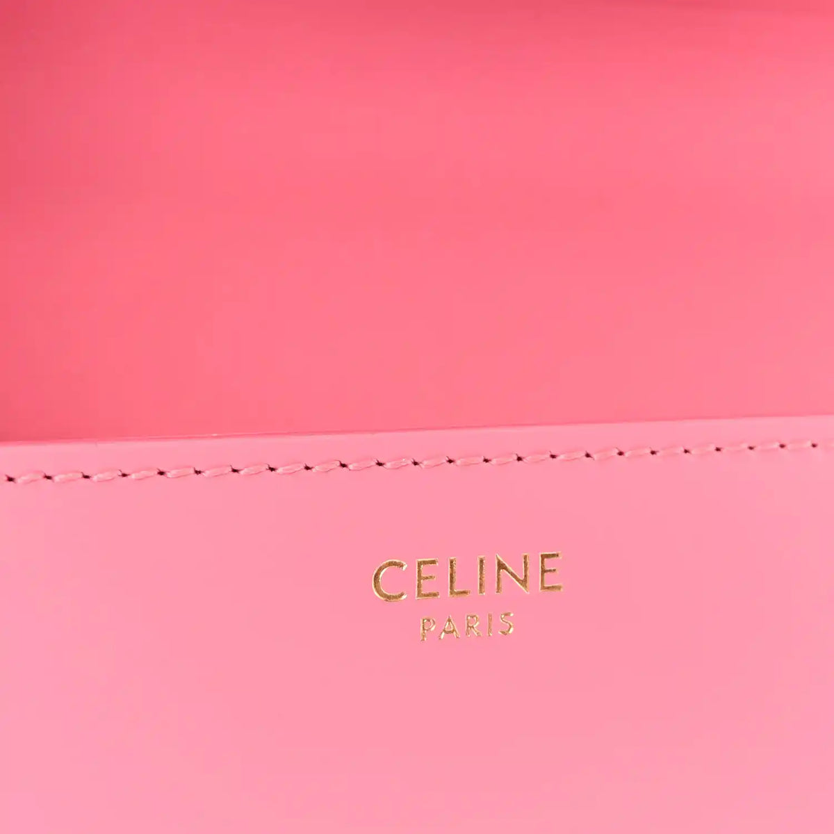 Flamingo pink leather back panel with 'CELINE PARIS' gold stamp