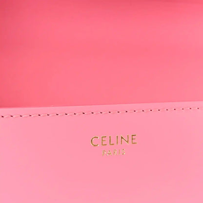 Flamingo pink leather back panel with 'CELINE PARIS' gold stamp