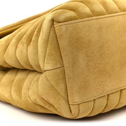 Chartreuse suede quilted satchel with flap edge detail and rounded corner