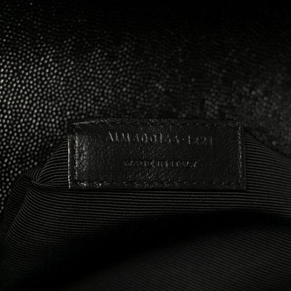 Black interior tag label with embossed text on lining
