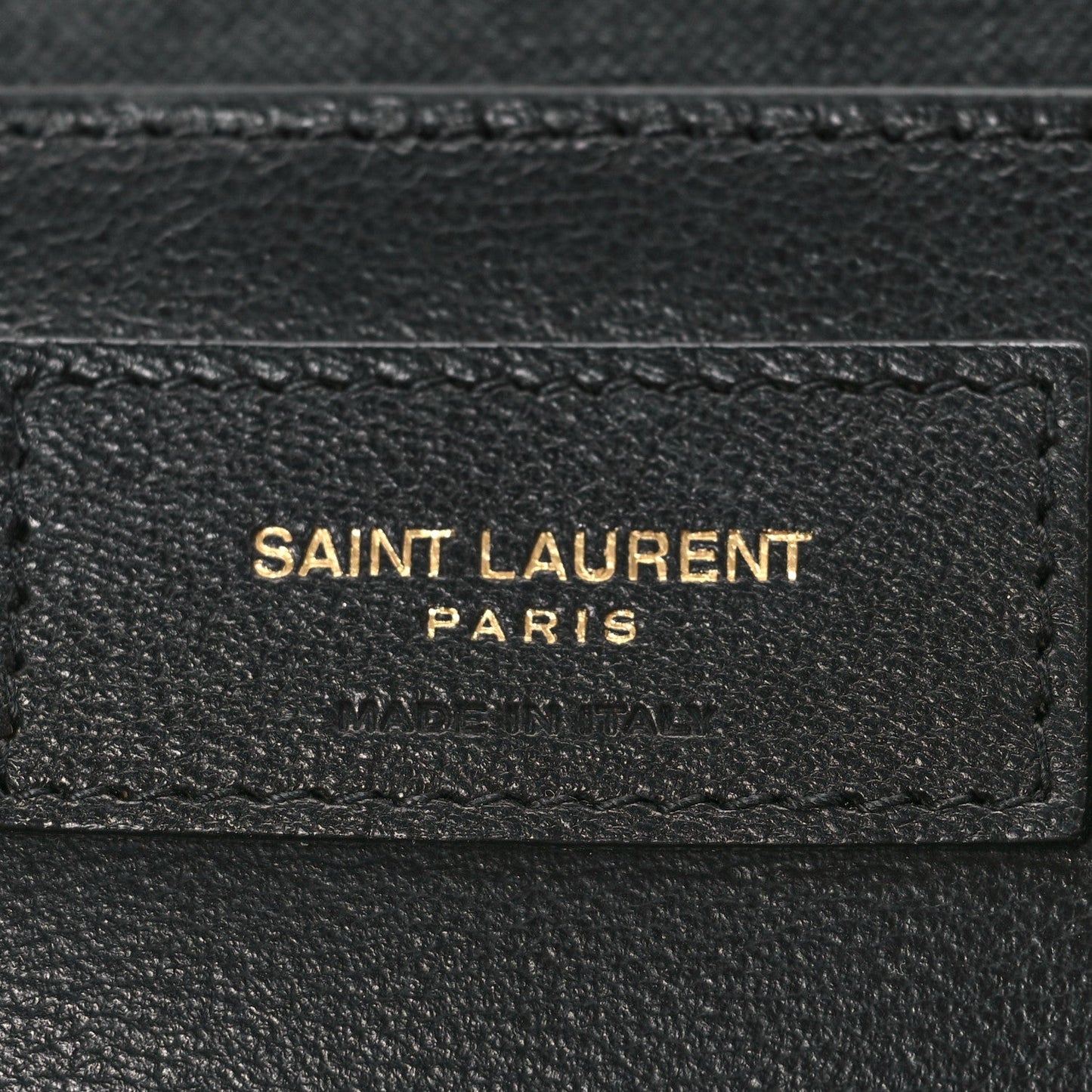 SAINT LAURENT PARIS leather logo label with Made in Italy text