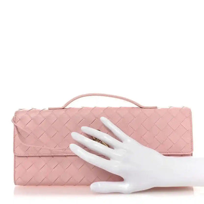 Bottega Veneta Rose pink intrecciato nappa clutch with gold-tone clasp and top handle