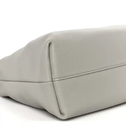 Loewe medium clutch bag in light grey with top fold seam and rounded edges