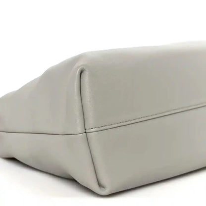 Loewe medium clutch bag in light grey with top fold seam and rounded edges