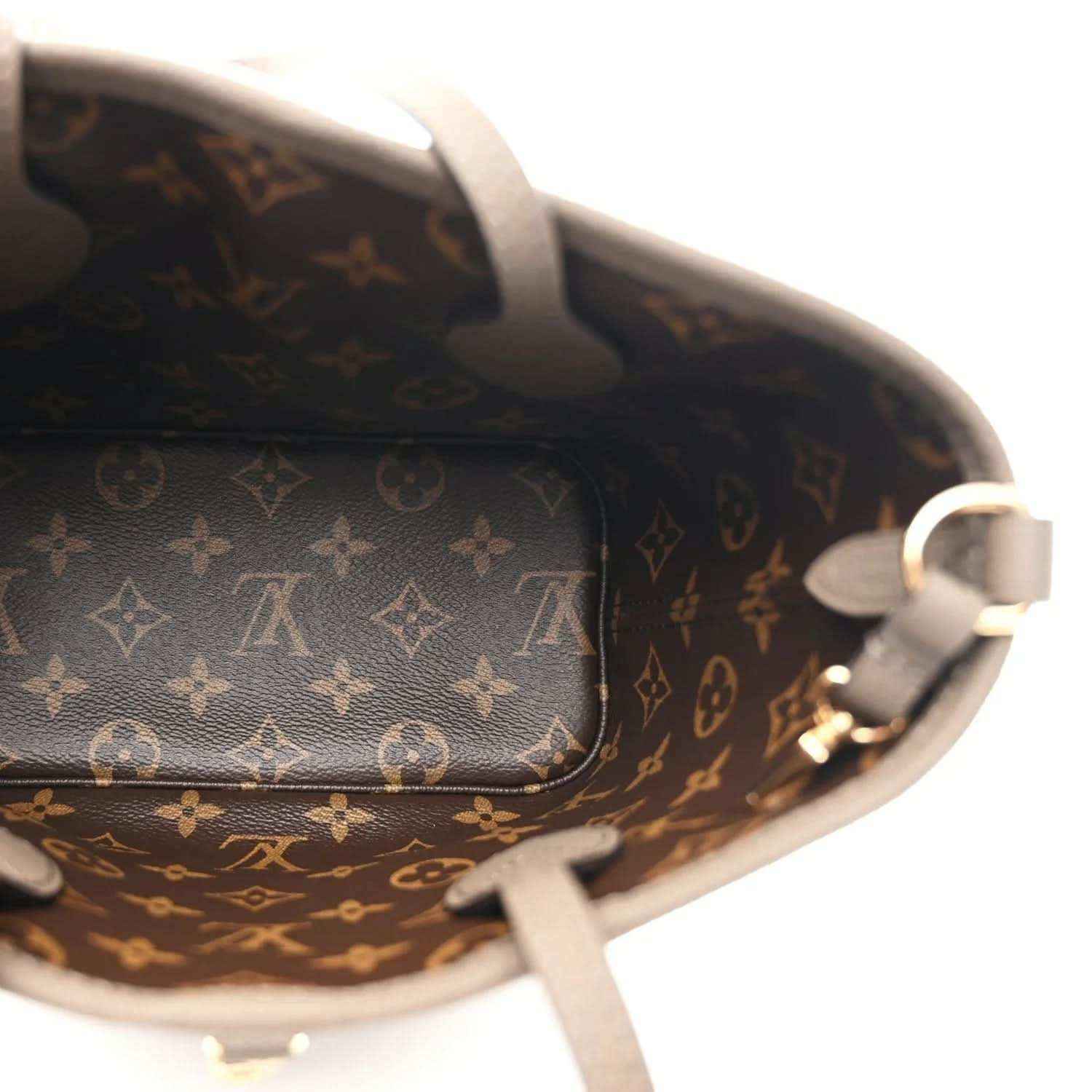 Monogram pouch interior lining with leather trim and zipper hardware