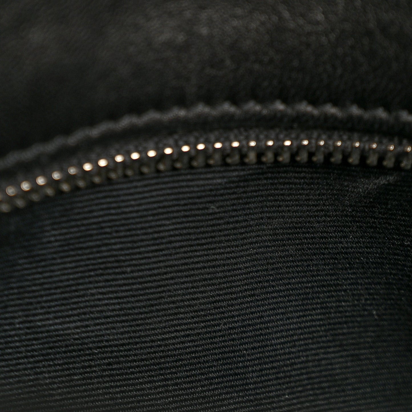 Black quilted lambskin medium satchel with topstitching and studded trim