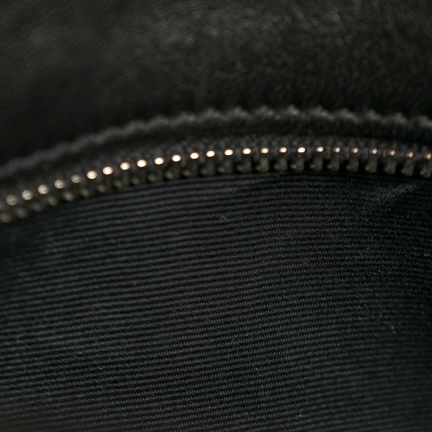 Black quilted lambskin medium satchel with topstitching and studded trim