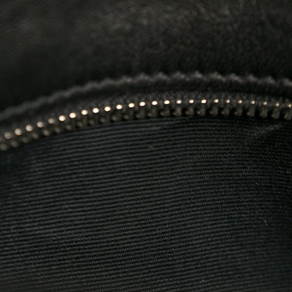 Black quilted lambskin medium satchel with topstitching and studded trim