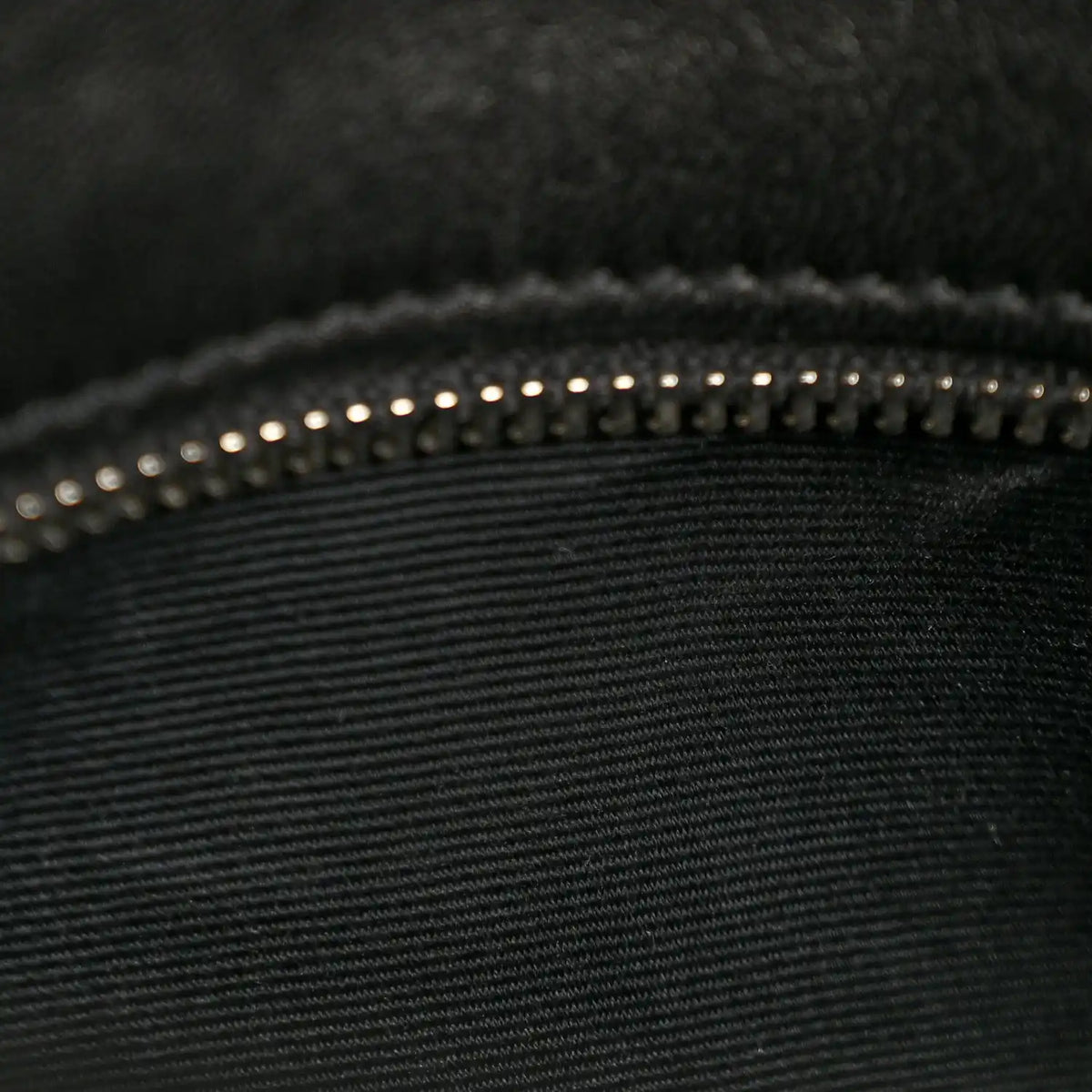 Black quilted lambskin medium satchel with topstitching and studded trim