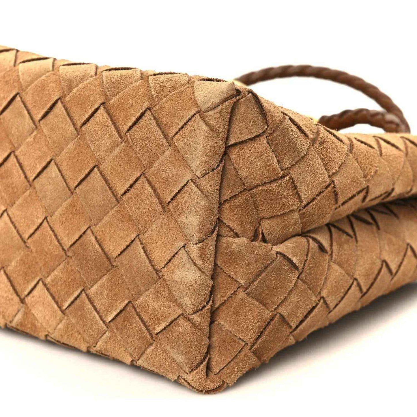 Amber suede woven corner with braided handle loop and stitched edge detailing