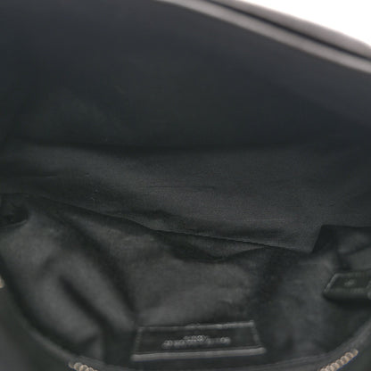 Black leather satchel interior lining with stitched pocket