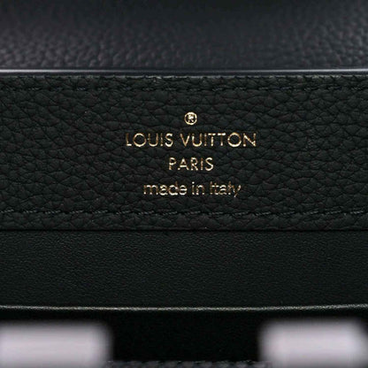 Black leather mini handbag with gold “Louis Vuitton” “Paris” stamp