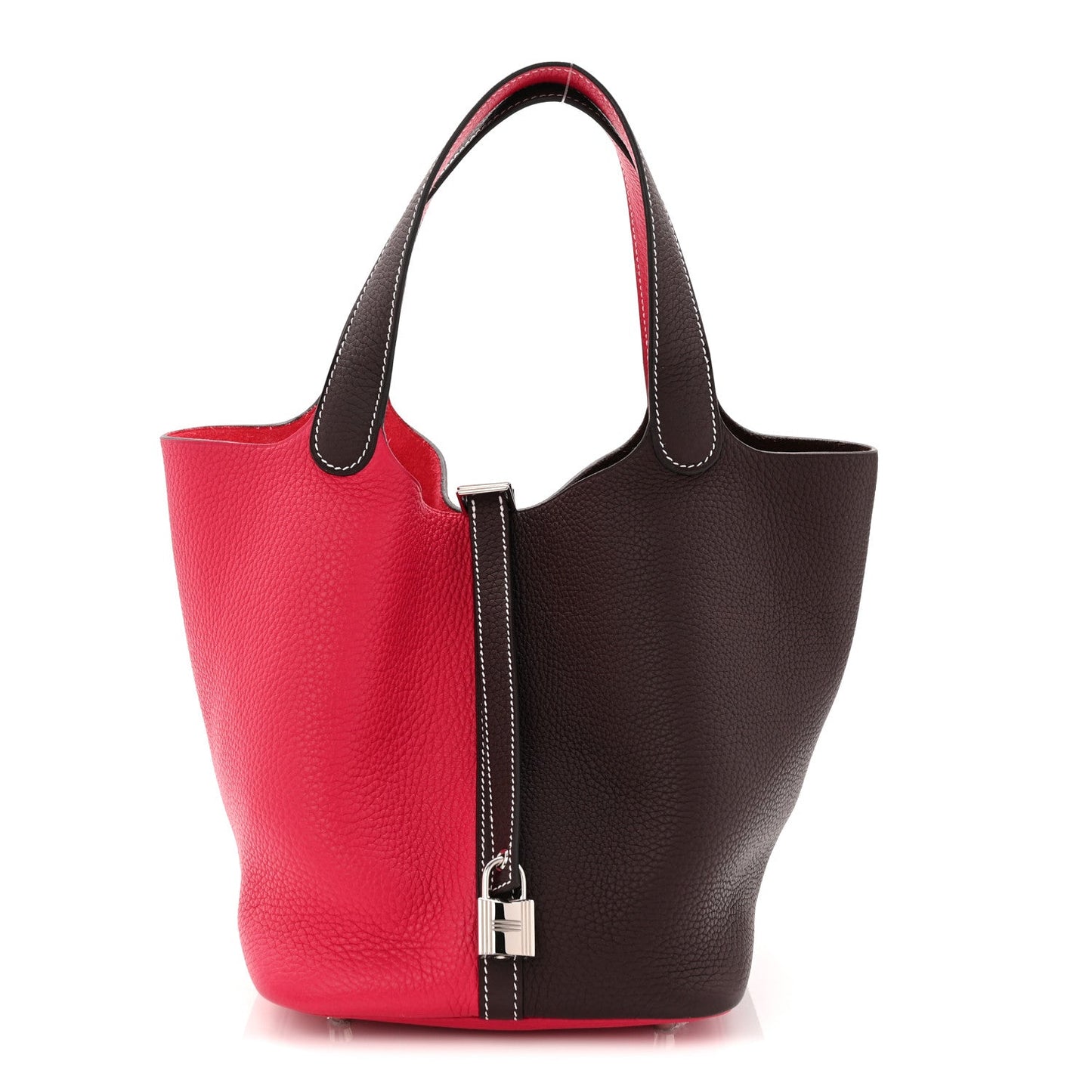 Two-tone bucket bag with bright red front panel, dark brown back panel, top handles