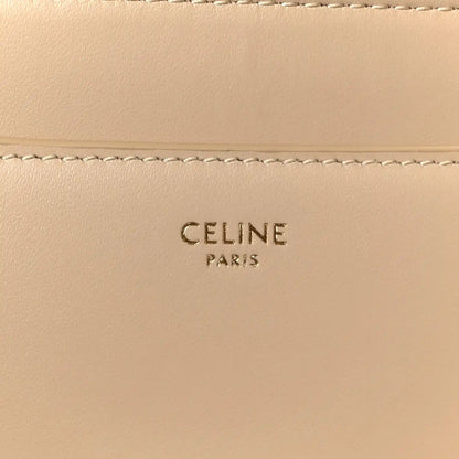 Celine Paris logo stamped on beige leather panel with stitching
