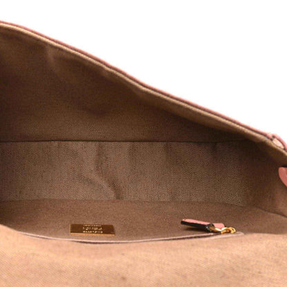 Fendi baguette shoulder bag interior with fabric lining, small tag, and zipper pocket