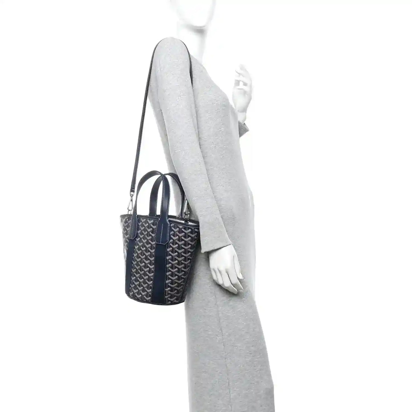 Navy patterned tote bag worn on a shoulder strap with top handles