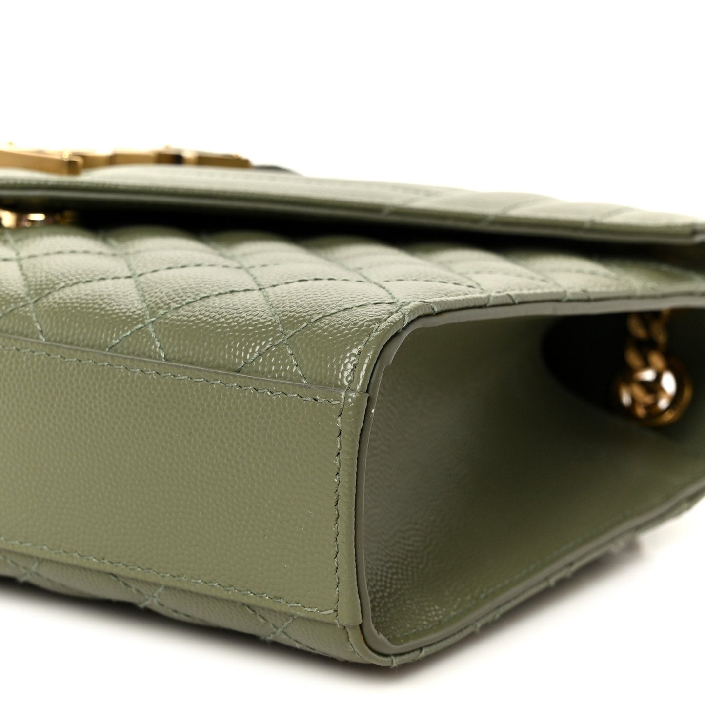 Light sage quilted leather satchel, corner close-up with gold-tone hardware