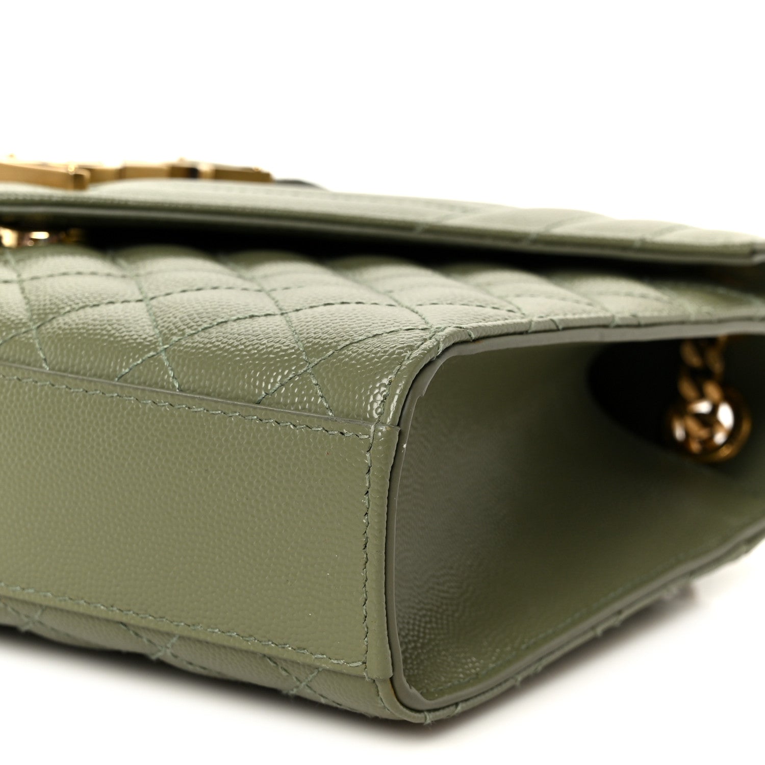 Light sage quilted leather satchel, corner close-up with gold-tone hardware