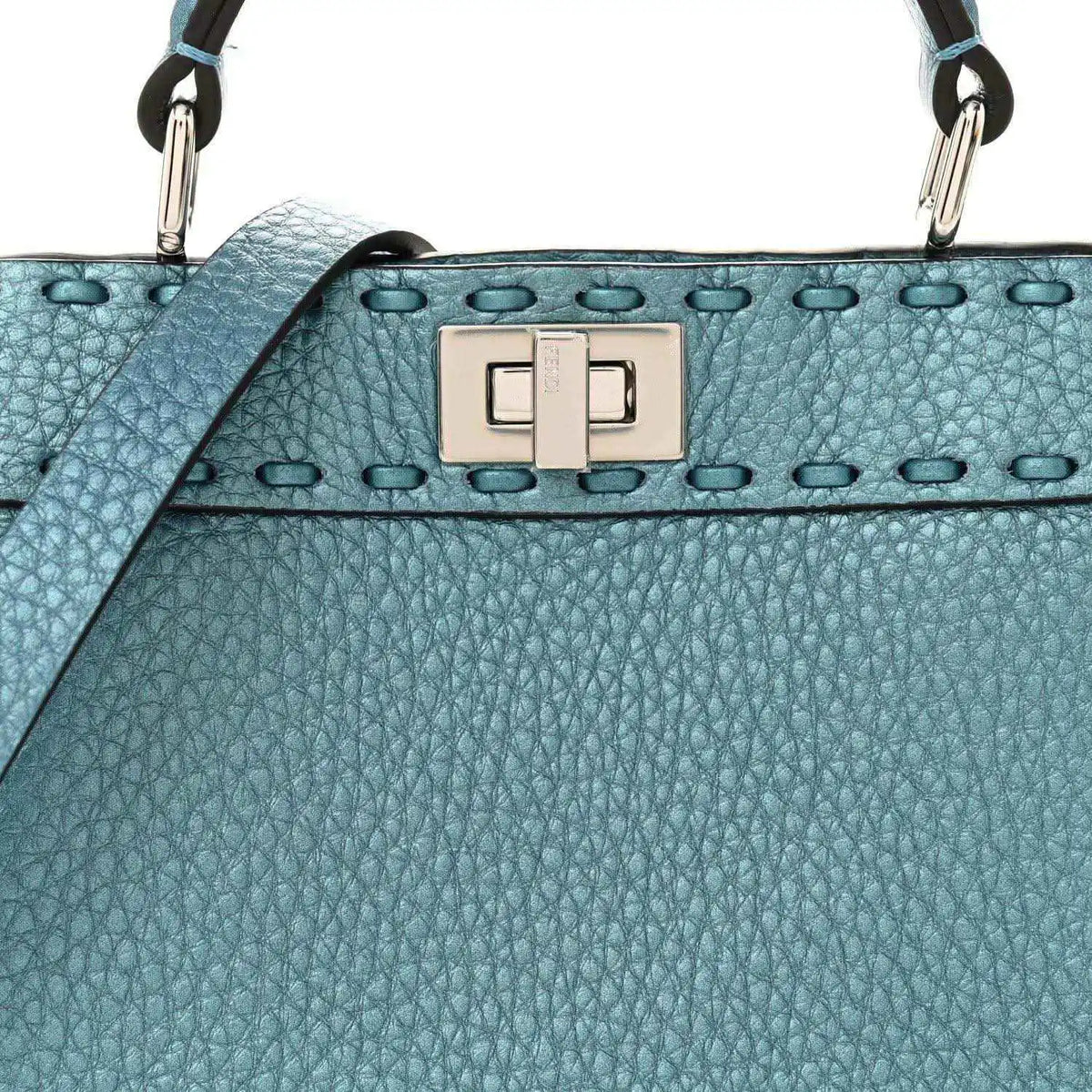 Blue pebbled leather petite satchel with front turn-lock clasp and studded trim.