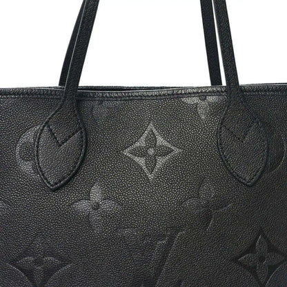 Neverfull MM tote bag handle area, dark black embossed monogram leather