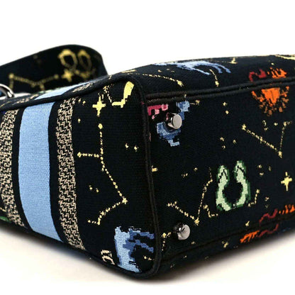 Canvas medium handbag, black with zodiac pixel pattern and blue stripe, top handles
