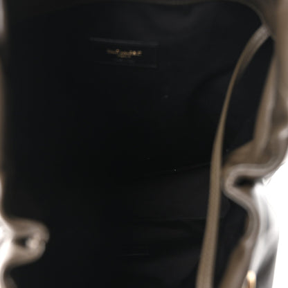 Leather shoulder bag interior view, open top with small logo patch