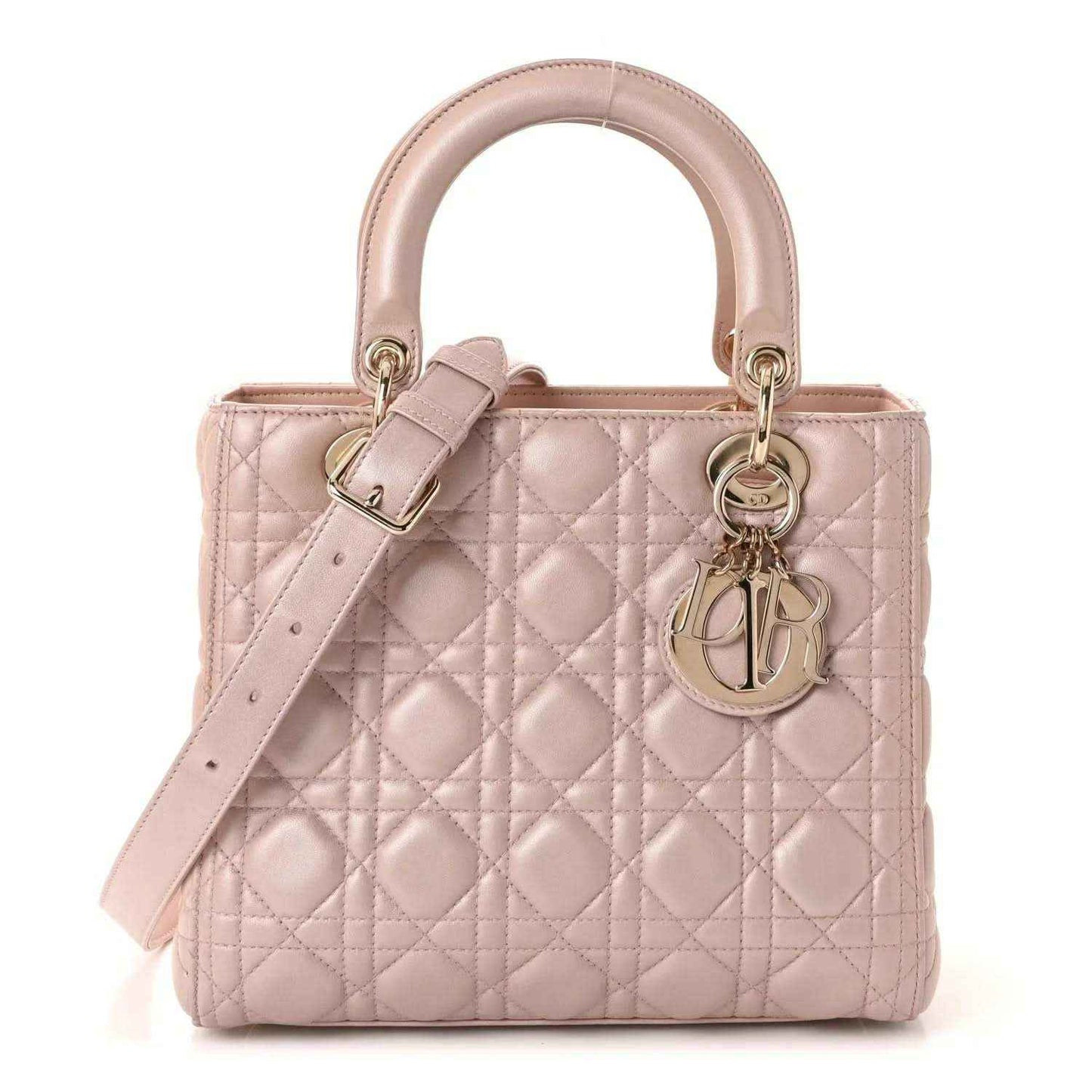 Light pink quilted handbag with top handles, detachable strap, buckle, and Dior charm
