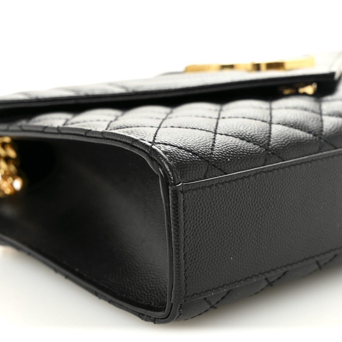 Black quilted leather satchel corner with smooth leather trim