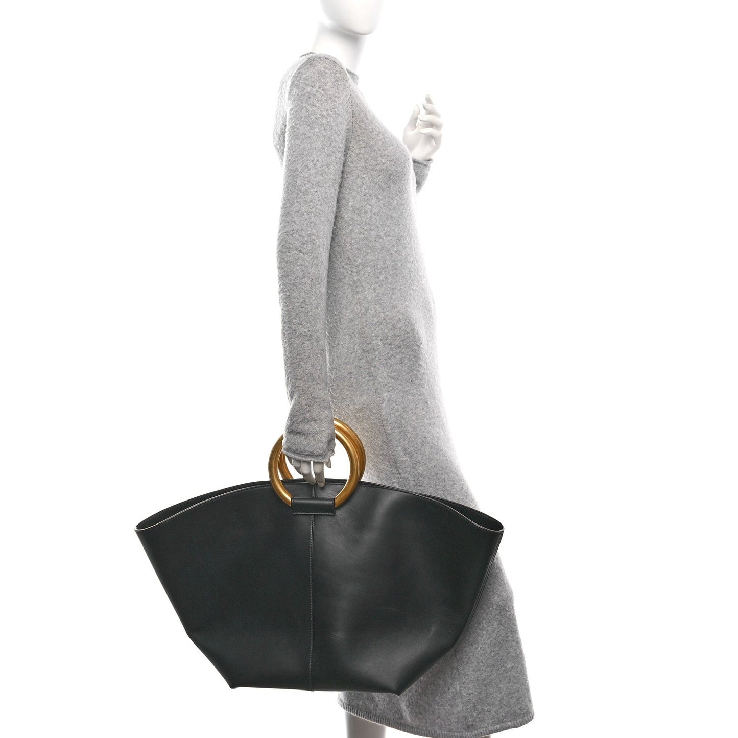 Black smooth calfskin trapezoid shopping tote with gold ring top handle