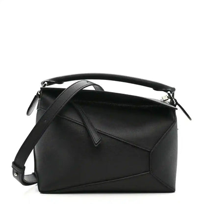 Small Puzzle Edge shoulder bag in black leather with top handle and shoulder strap