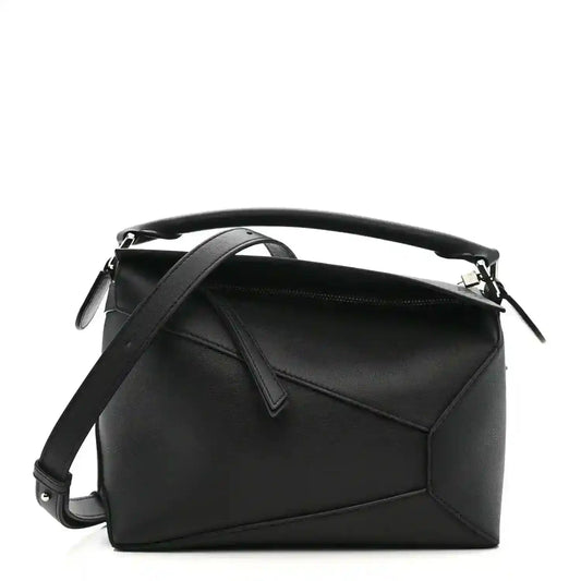 Small Puzzle Edge shoulder bag in black leather with top handle and shoulder strap