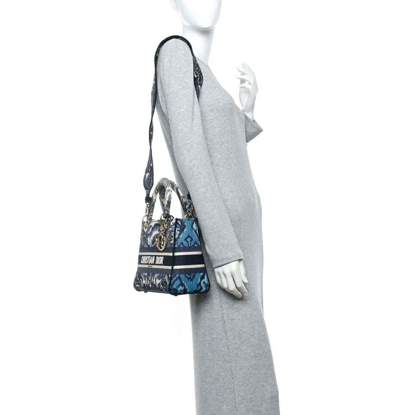 Blue palm toile mini bag with gold chain crossbody strap and small logo charm