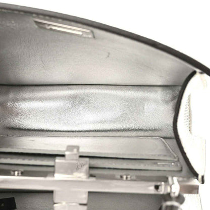 Satchel interior lining with top hinge and hardware detail