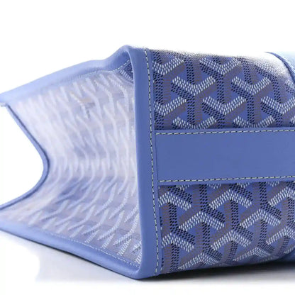 Goyardine Villette PM tote bag side view, blue coated canvas with stitched edge