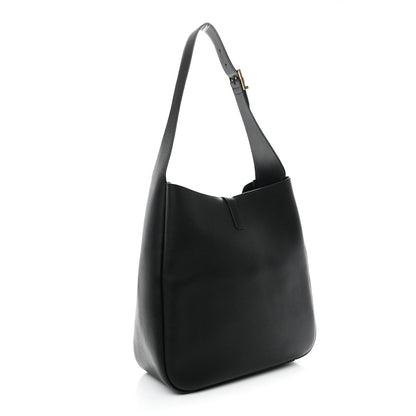 Black leather soft hobo bag with wide strap, slouchy silhouette and gold hardware