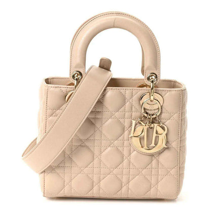 Beige quilted lambskin mini handbag with top handle and fabric wrist strap