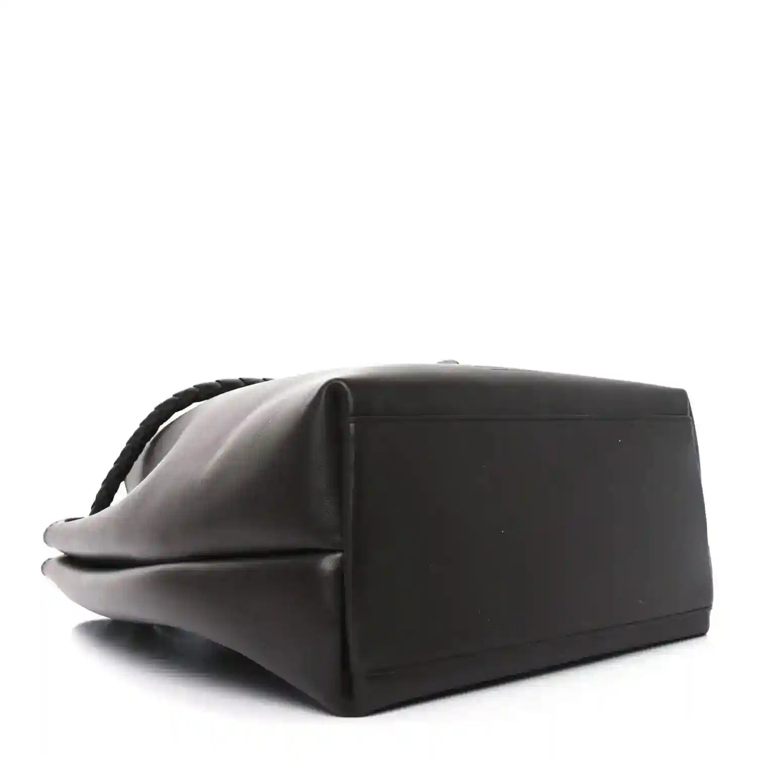 Small bucket bag in dark leather with stitched side panels and short top handle