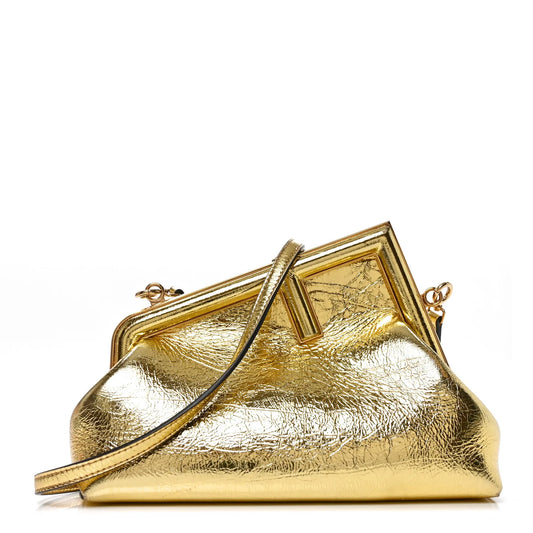 Small metallic gold leather frame shoulder bag with top handle and strap
