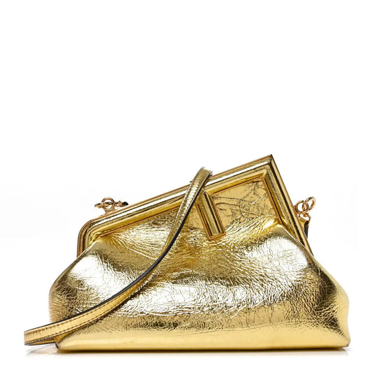 Small metallic gold leather frame shoulder bag with top handle and strap